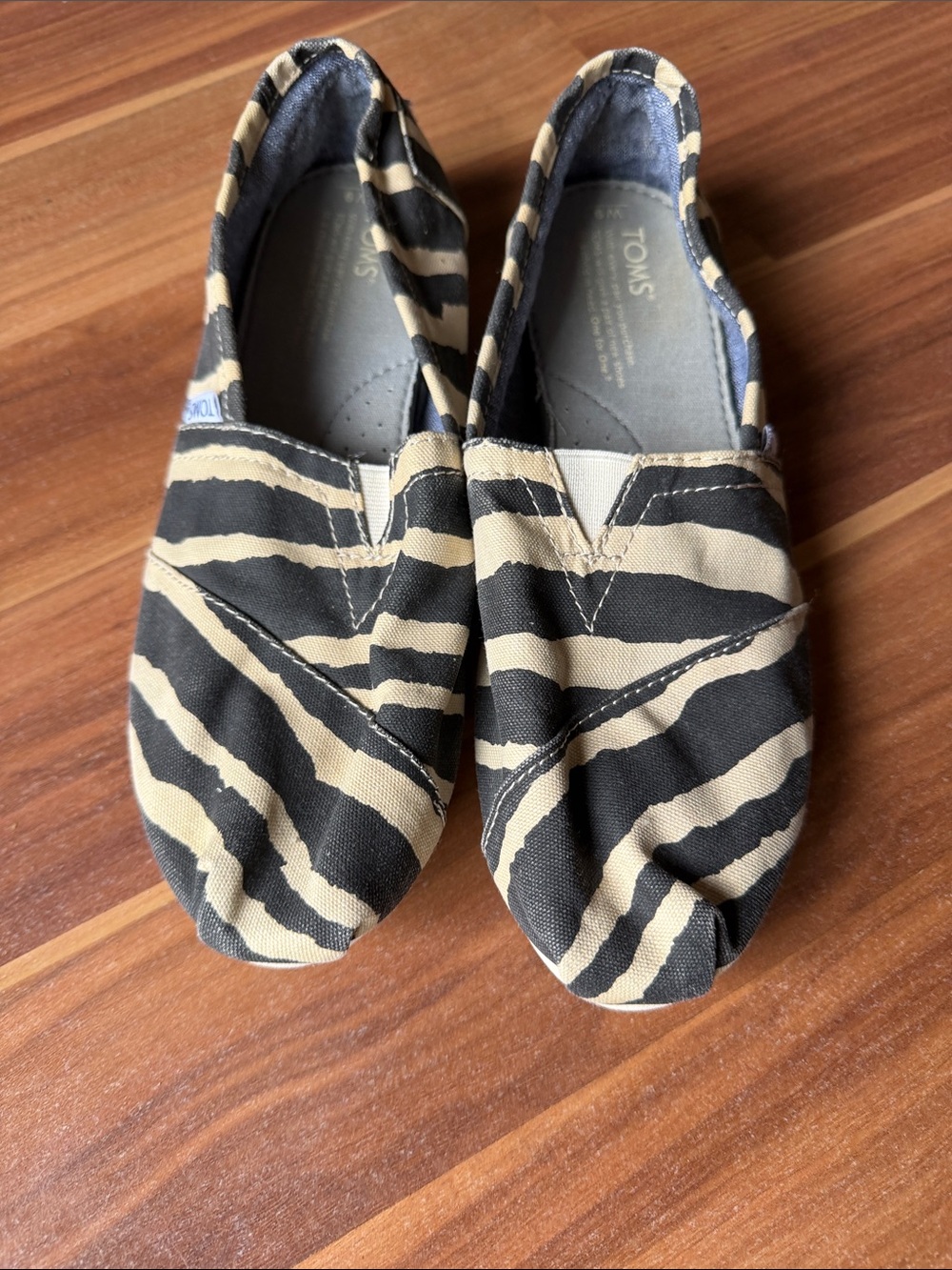 TOMS Kids Zebra-Print Slip-On Sneakers in Black & Tan